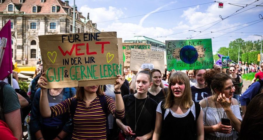 Young women march in a climate protest