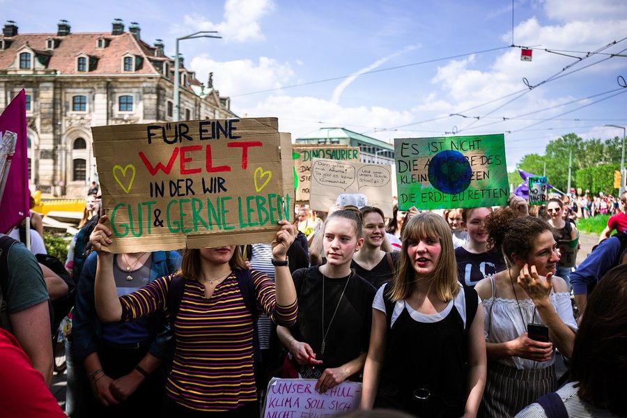 Young women march in a climate protest