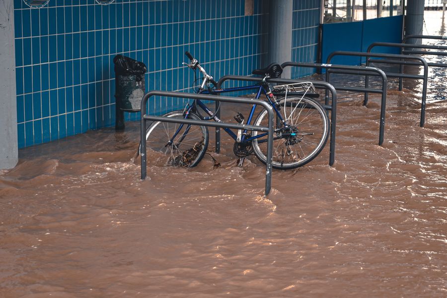 A bike in brown floodwater
