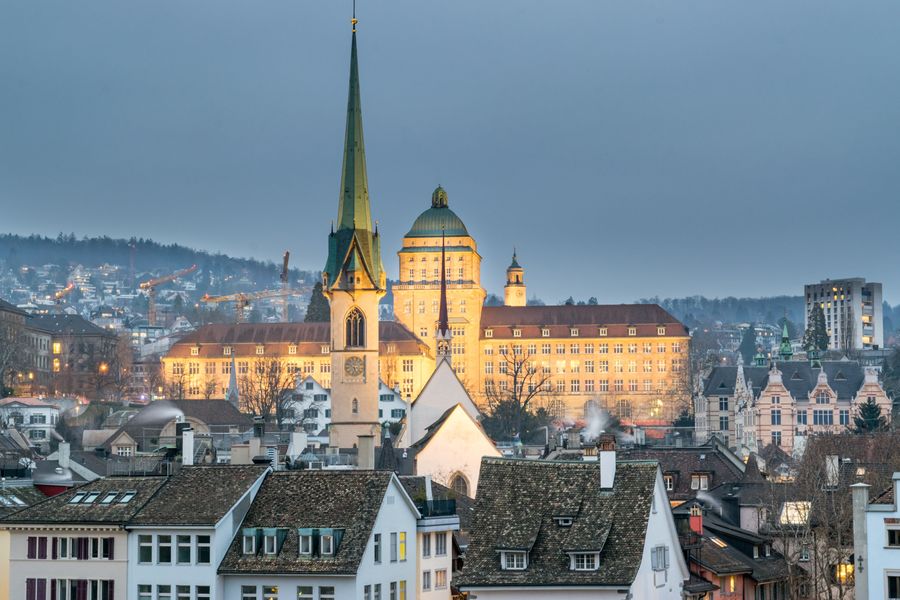 A Zurich skyline in the dusk. Image by Nate Hovee on Pexels