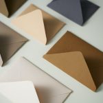 Envelopes in shades of brown and cream. By Cottonbro Studios on Pexels