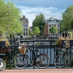 bicycles on a bridge in amsterdam, by RalfGervink on Pixabay