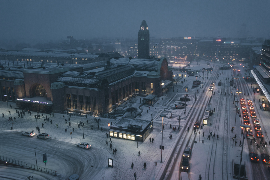 A snowy dusk street scene in Finland. By Alexandr Bormotin via Unsplash