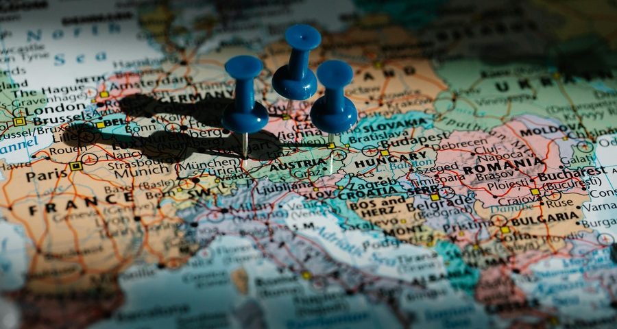 a map of Europe with 3 blue pins. By Lara Jameson on Pexels