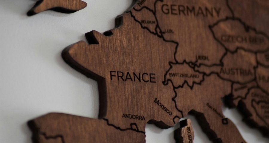 Part of a wooden map of Europe. By Anthony Beck on Pexels