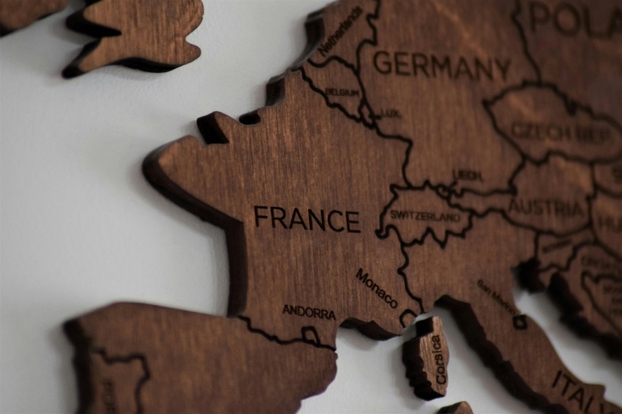 Part of a wooden map of Europe. By Anthony Beck on Pexels