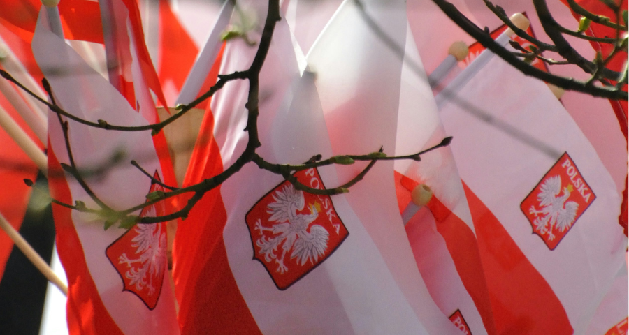 Polish flags by Natalia Gasiorowska unsplash