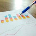 Blurred graphs. By Lukas on Pexels