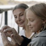 A young girl with her grandparents. By cottonbro studio via Pexels