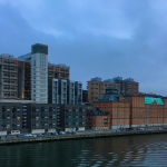 Swedish office buildings on the river. By ptrpl4 via Unsplash