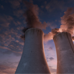 power plant smoke stacks by Planet Volumes on Unsplash+