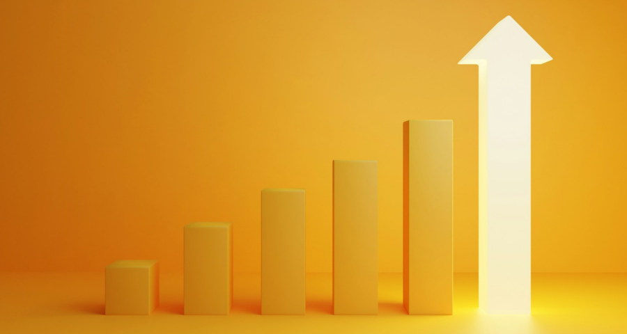 A bar chart with the final bar illuminated and in the shape of an arrow. By Getty Images for Unsplash+