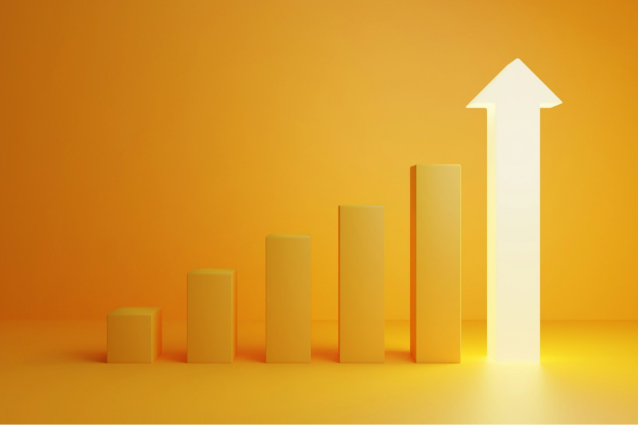 A bar chart with the final bar illuminated and in the shape of an arrow. By Getty Images for Unsplash+