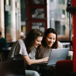Two women at a laptop by Ilyuza Mingazova via Unsplash