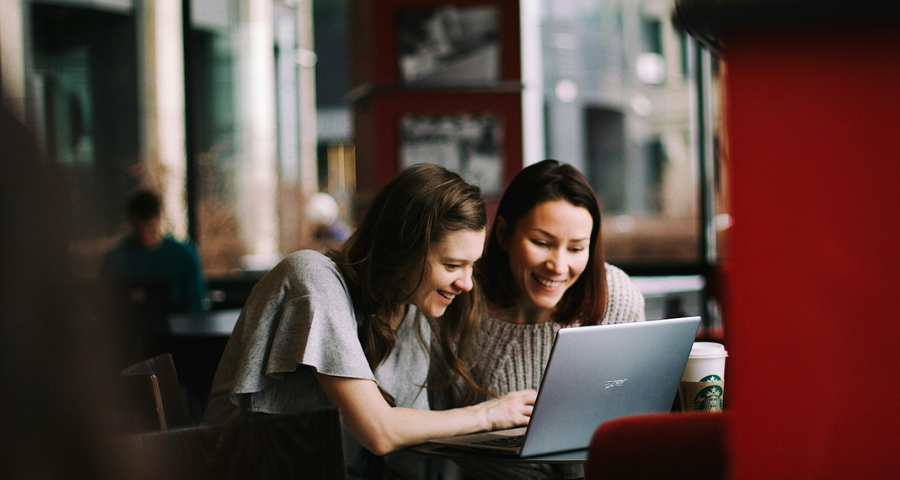 Two women at a laptop by Ilyuza Mingazova via Unsplash