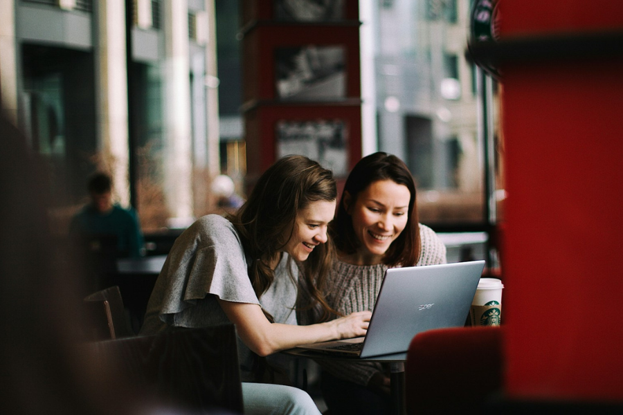 Two women at a laptop by Ilyuza Mingazova via Unsplash
